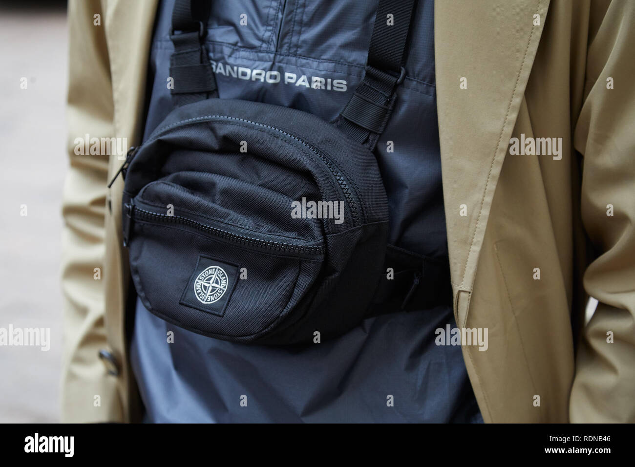 MILAN, ITALY - JANUARY 12, 2019: Man with brown Louis Vuitton backpack and  black padded jacket before Frankie Morello fashion show, Milan Fashion Week  Stock Photo - Alamy
