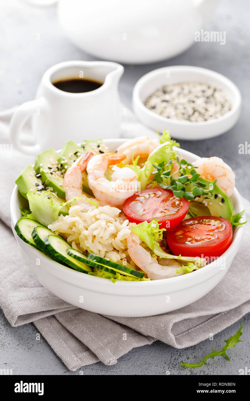 Hawaiian poke bowl with shrimps, rice and vegetables, healthy Buddha ...