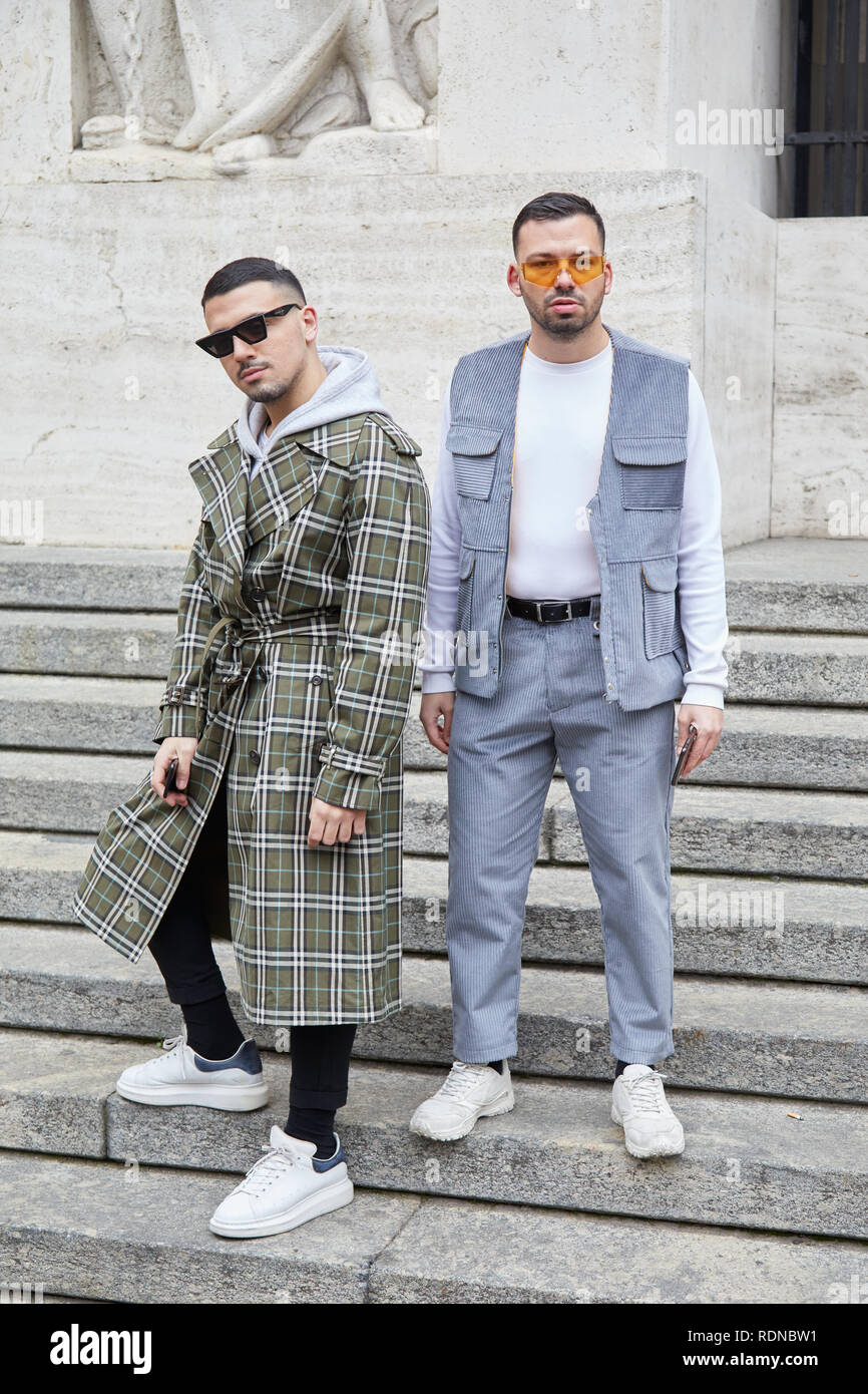 MILAN, ITALY - 12, 2019: Men with Burberry coat and gray gilet and trousers before Frankie Morello fashion show, Milan Fashion Week street sty Stock - Alamy