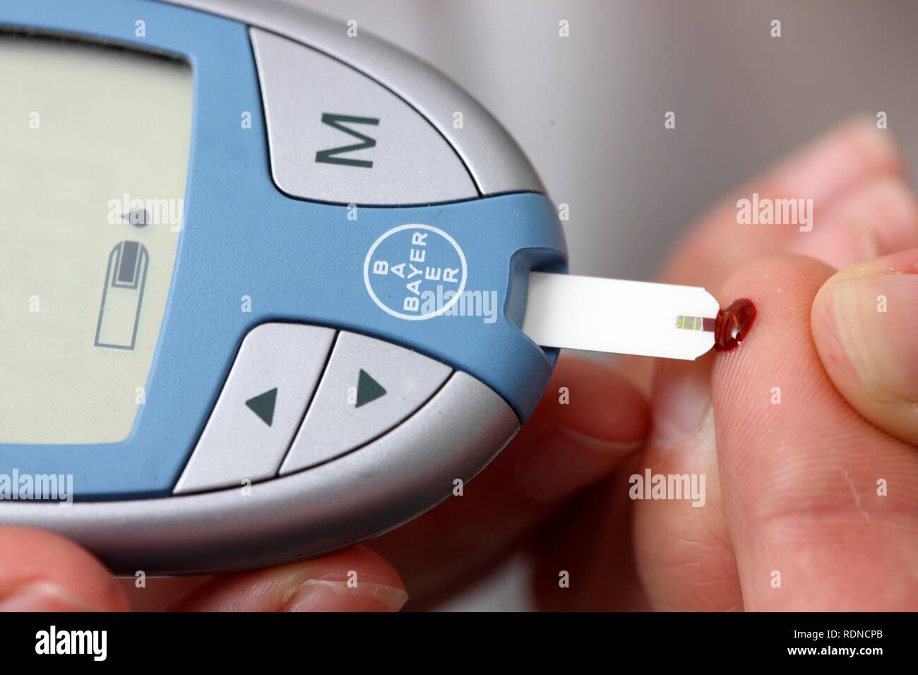 Blood sugar test of a diabetic patient Stock Photo