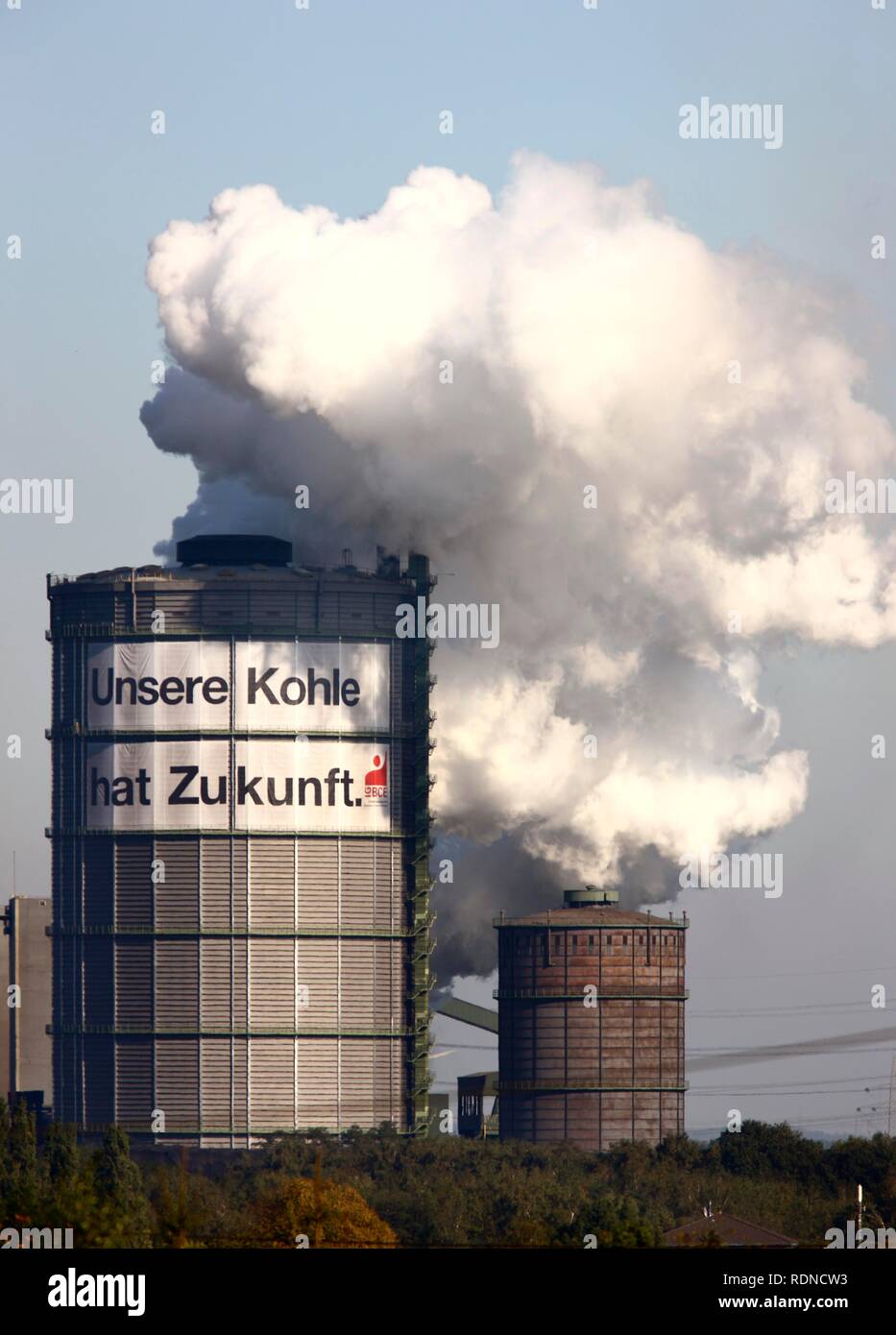 Gas holder of the Kokerei Prosper coking plant, with a large poster of the IGBCE trades union with a lettering 'Unsere Kohle hat Stock Photo