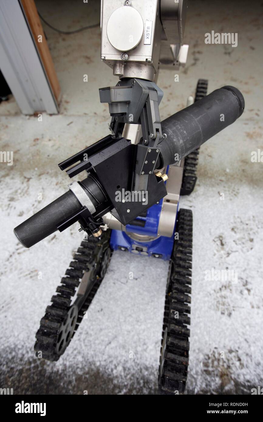 Water gun on a radio control robot from the Telerob company to defuse explosives, bombs and other dangerous devices by remote Stock Photo