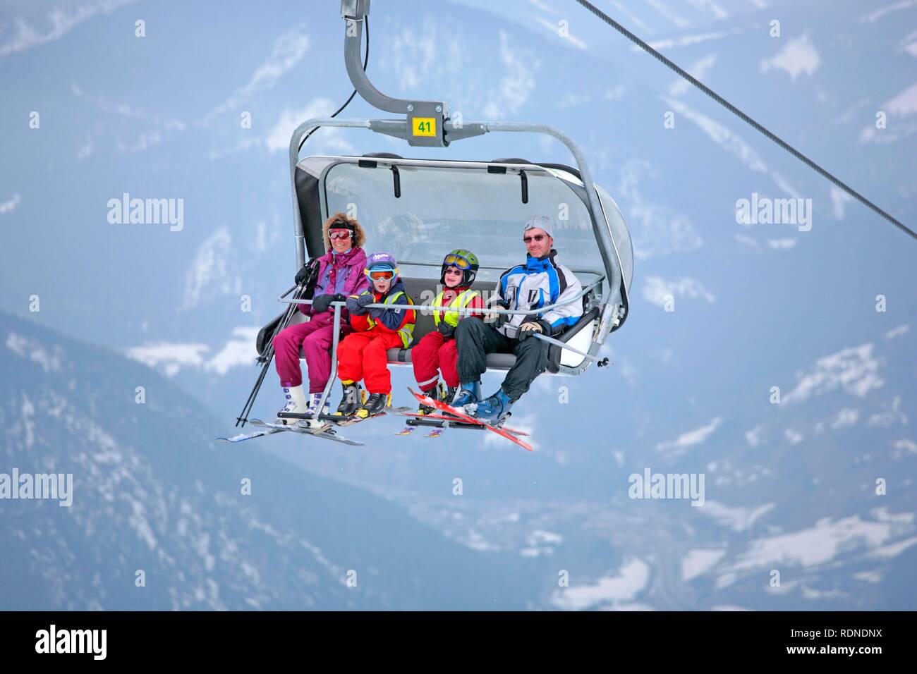 Family in the chair lift to Hochwurzen, Styria, Austria, Alps, Europe Stock Photo