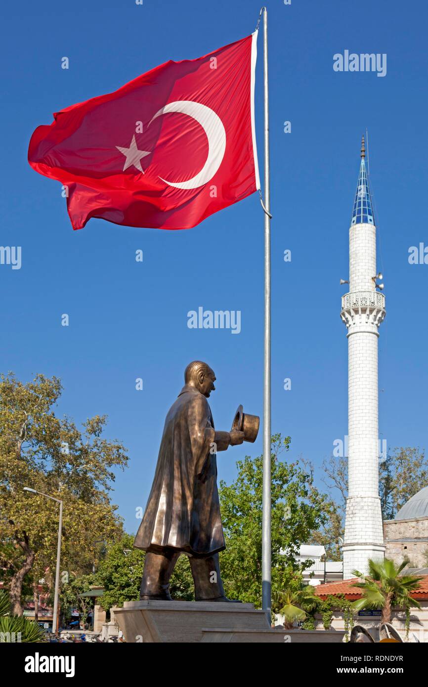 Ataturk statue, minaret, flag, Dalyan, Dalyan Delta, Turkish Aegean, Turkey Stock Photo