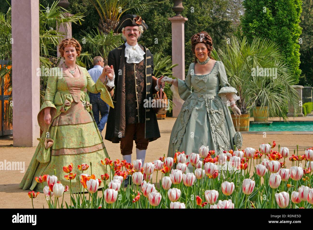 Costumed actors and actresses in the Kurpark, spa park with palm gardens, Bad Pyrmont, Lower Saxony Stock Photo