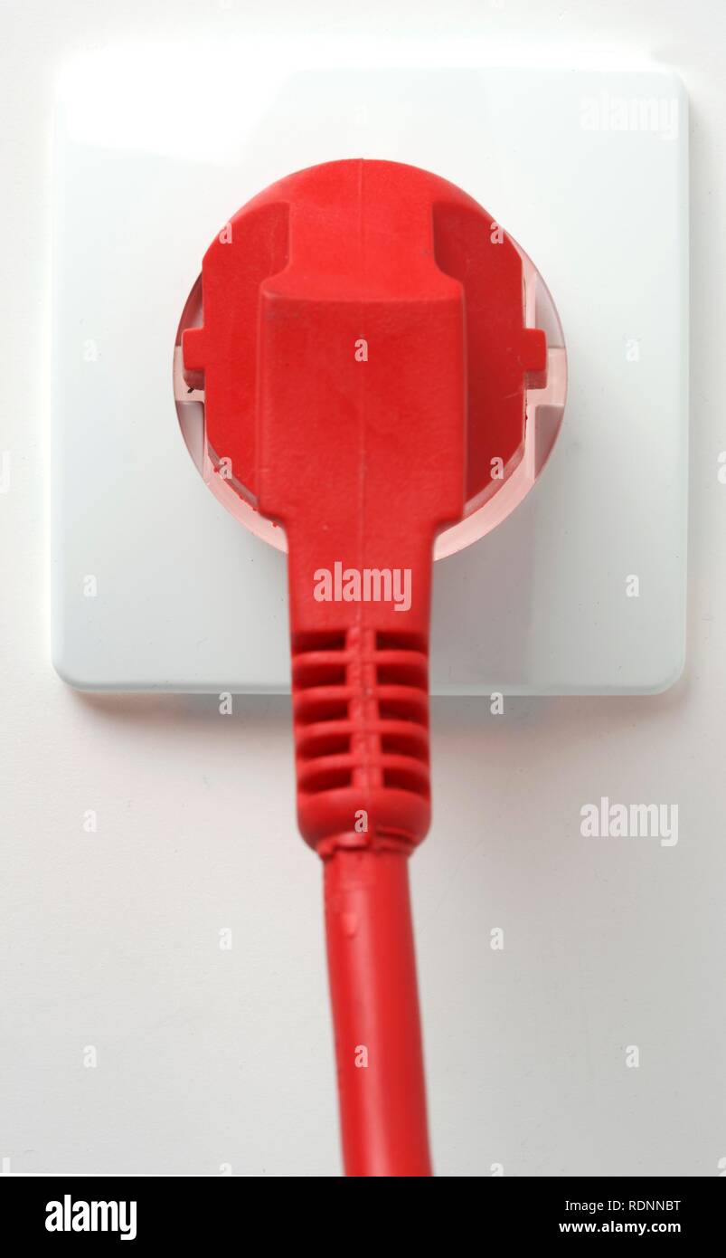 Safety plug, two poles, in outlet, power Stock Photo