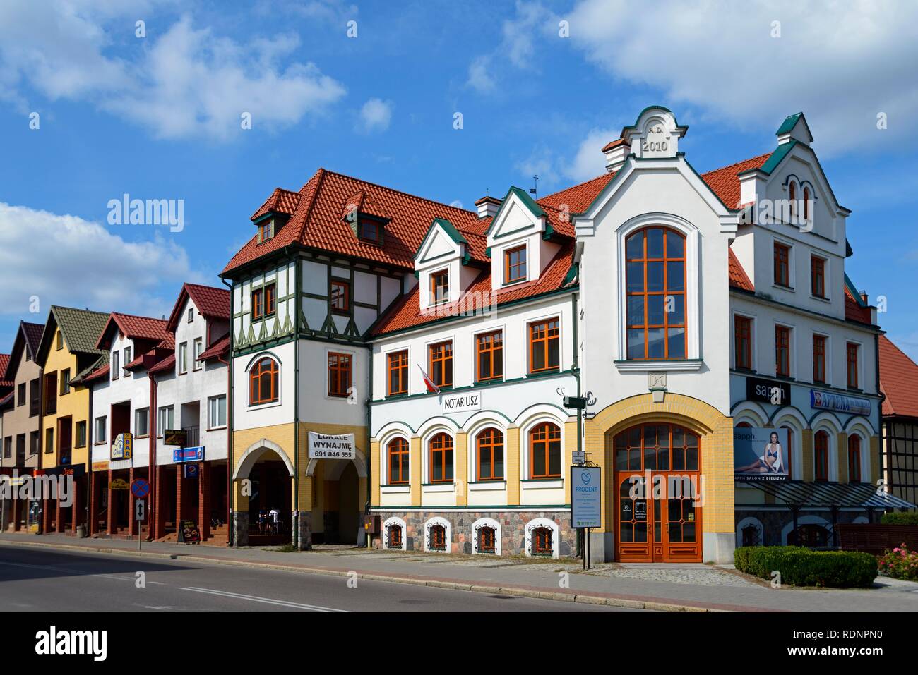 Houses in the street Kosciuszki, Pisz, Warmia-Masuria, Johannisberg, Warminsko-Mazurskie, Poland Stock Photo