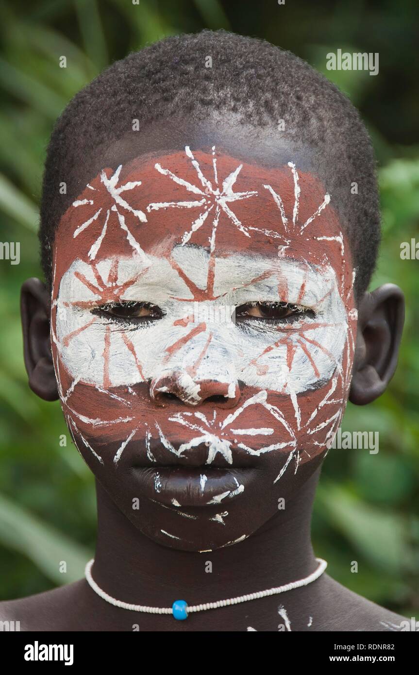 Surma boy with facial painting, Kibish, Omo River Valley, Ethiopia, Africa Stock Photo