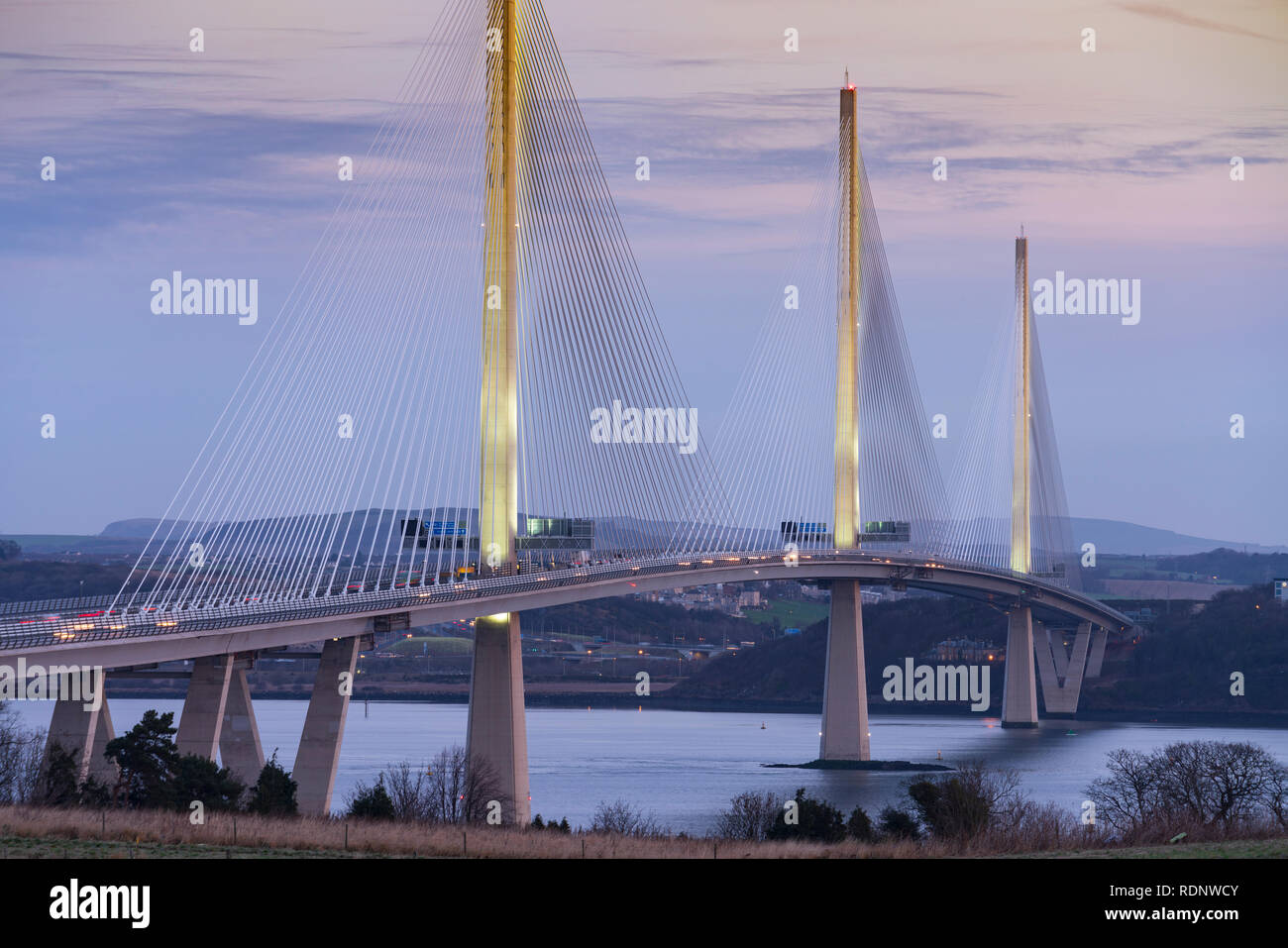 View at sunrise of Queensferry Crossing Bridge spanning the Firth Of Forth river at South Queensferry in Scotland, UK Stock Photo