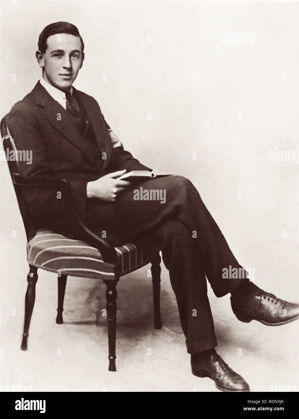 C.S. (Clive Staples) Lewis, British writer and lay theologian, in 1919 after returning from World War One (where he was wounded during the battle of Arras) and resuming his studies at University College, Oxford. At the time of this photo Lewis was an agnostic. In 1931, through friendship and conversation with J.R.R. Tolkien and Hugo Dyson, Lewis became a Christian. C.S. Lewis is popular worldwide for his many brilliant writings, including The Chronicles of Narnia and The Screwtape Letters. Stock Photo