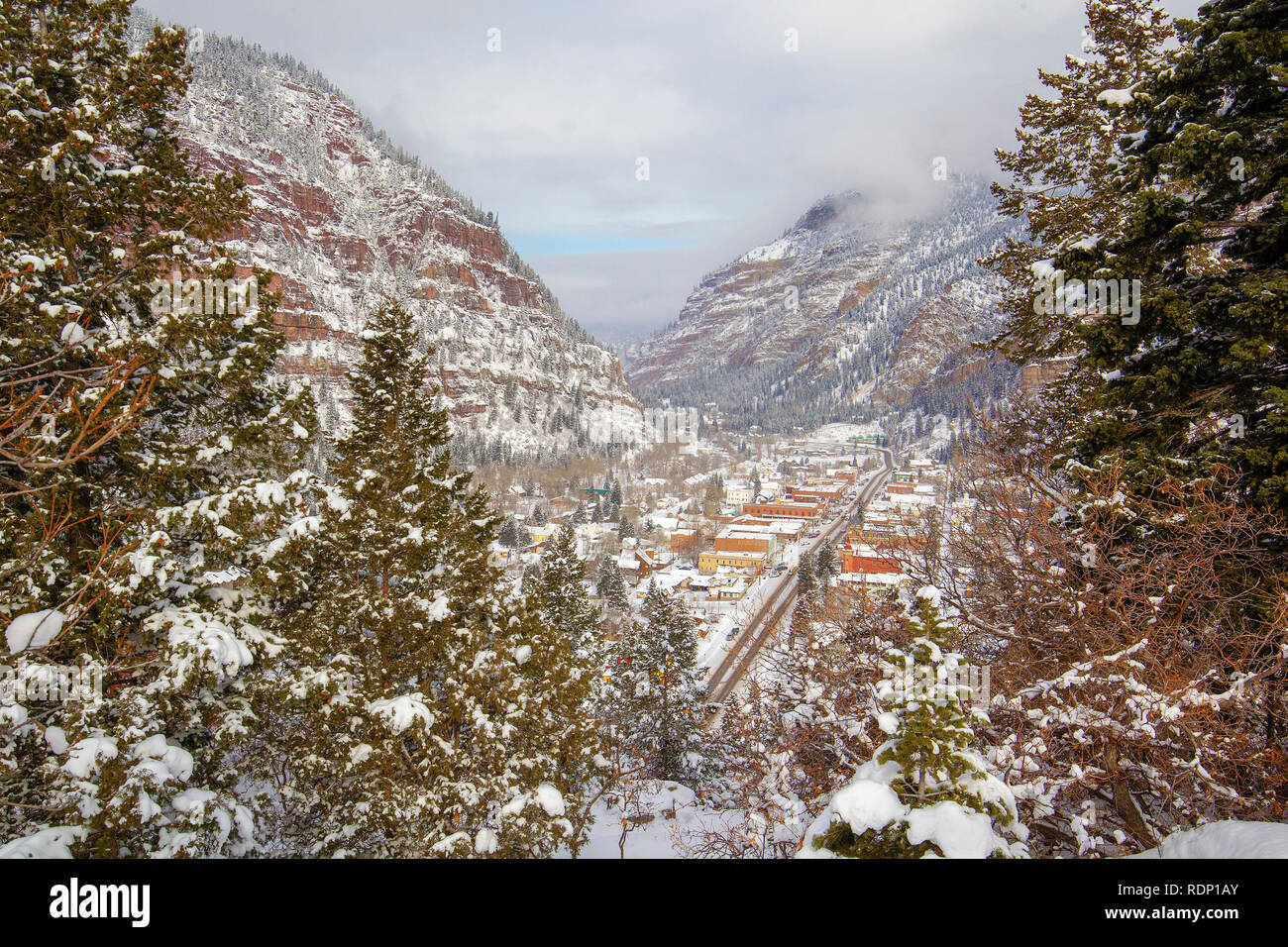 Ouray, Colorado after a new snowfall, surrounded on three sides with 13,000 foot snow covered peaks of the Rocky Mountains. Stock Photo