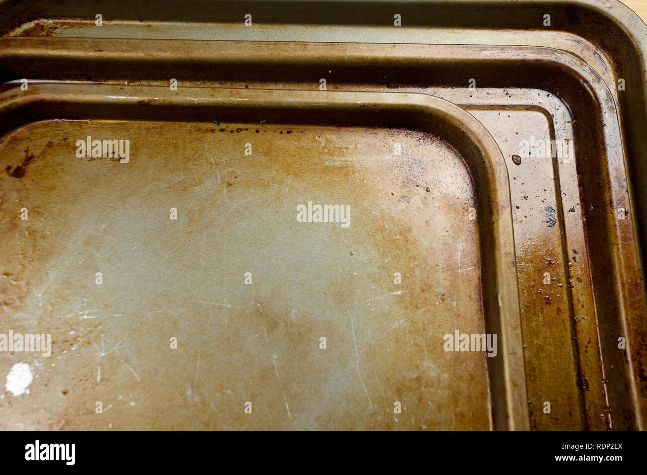 old stained baking trays Stock Photo