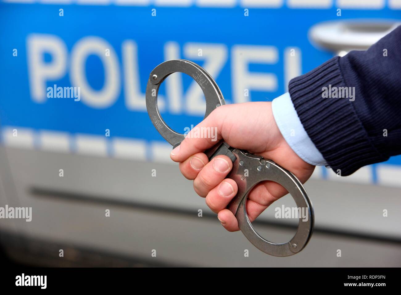 Police officer handcuffs hires stock photography and images Alamy