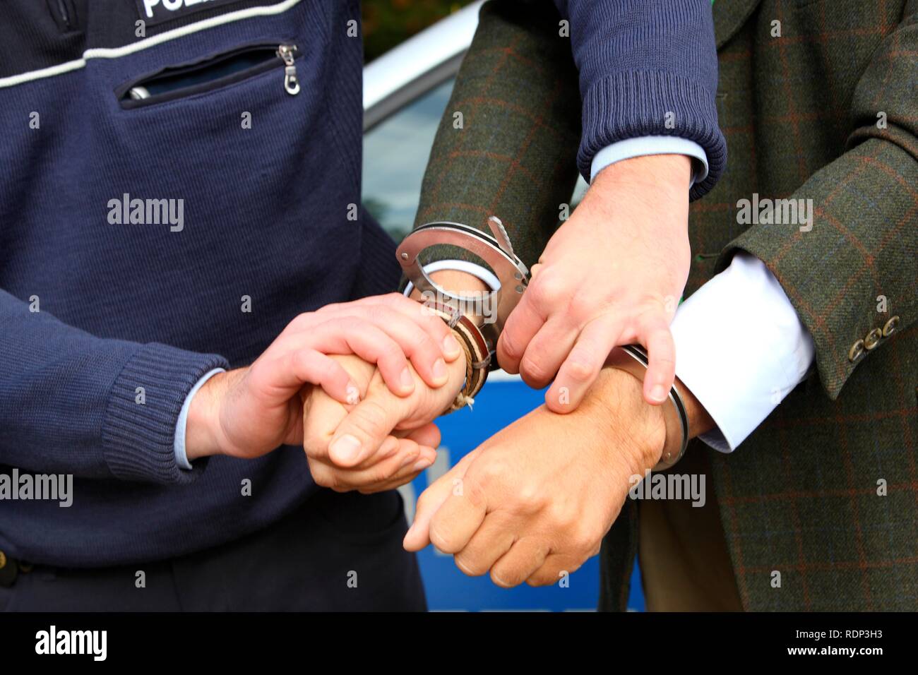 Arrested handcuffs man police hires stock photography and images Alamy