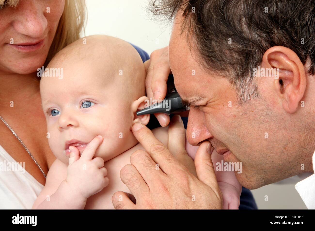 Doctor's surgery, mother and child at the paediatrician's, medical examination of an infant, preventive medical examination Stock Photo