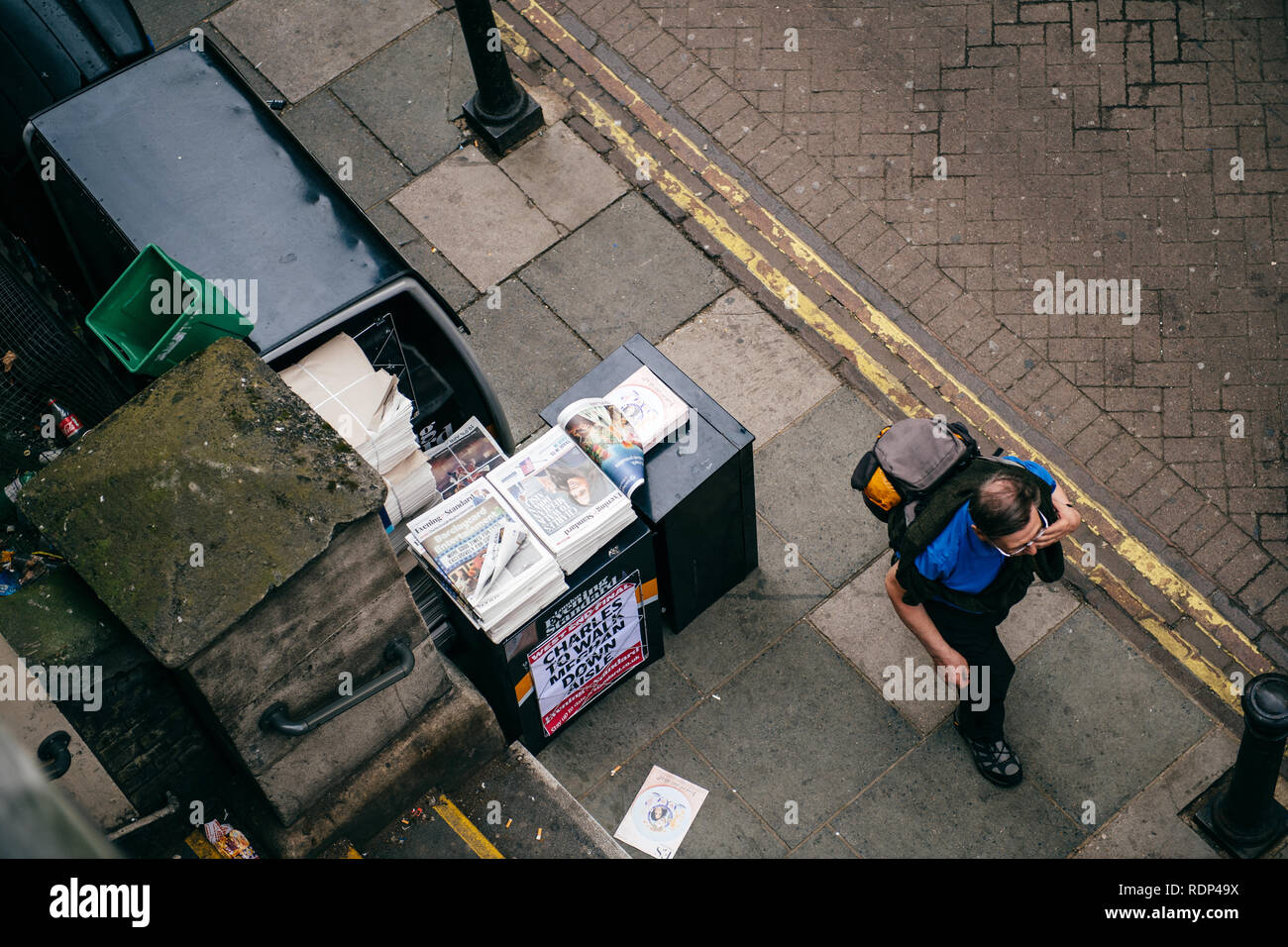 LONDON, UNITED KINGDOM - MAY 18, 2018: View from above of London Evening Standard distribution newspaper stand with large banner Prince Charles to walk Meghan Markel down aisle  Stock Photo