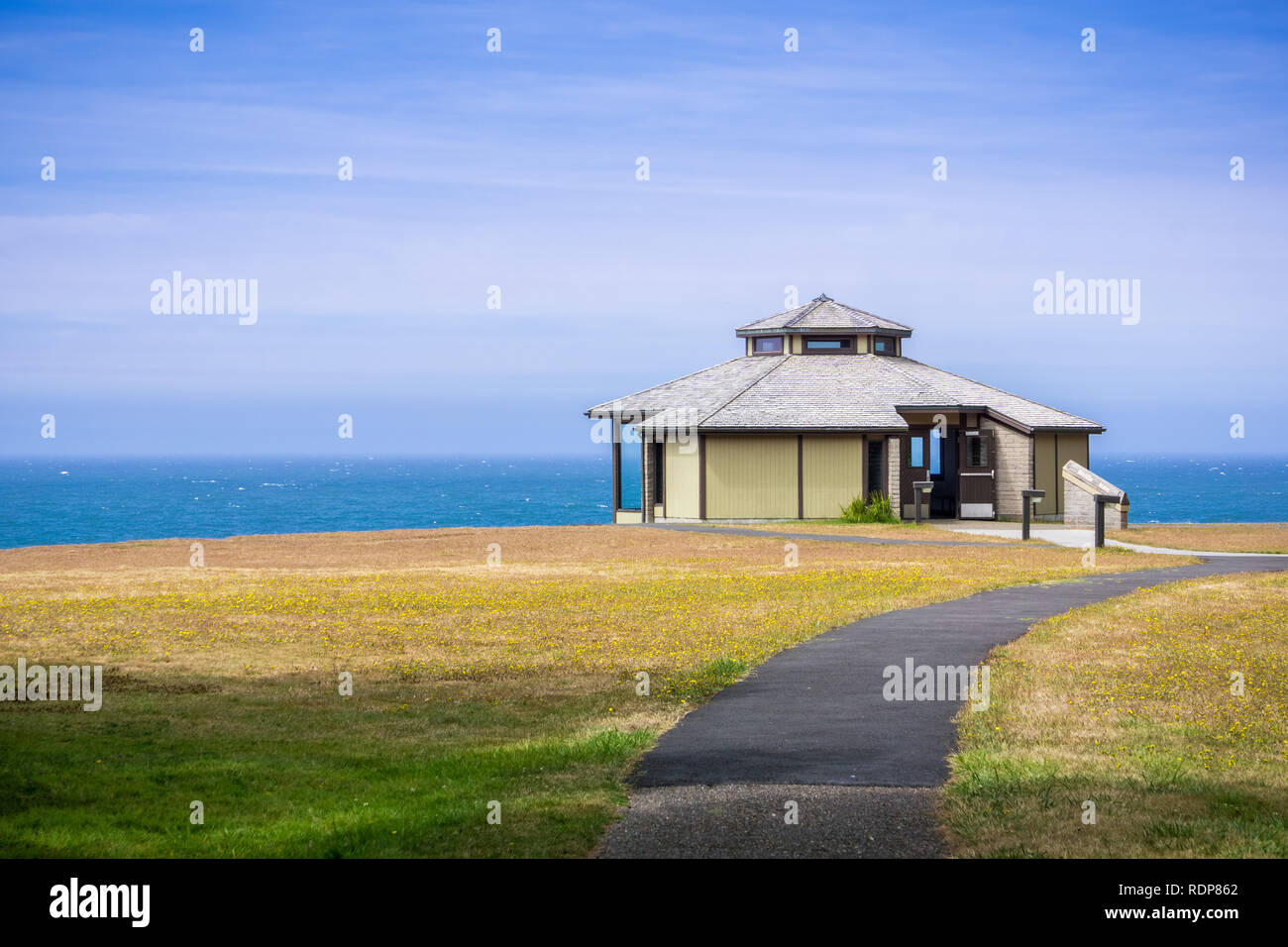 Pavilion on the shoreline of the Pacific Ocean on a sunny summer day