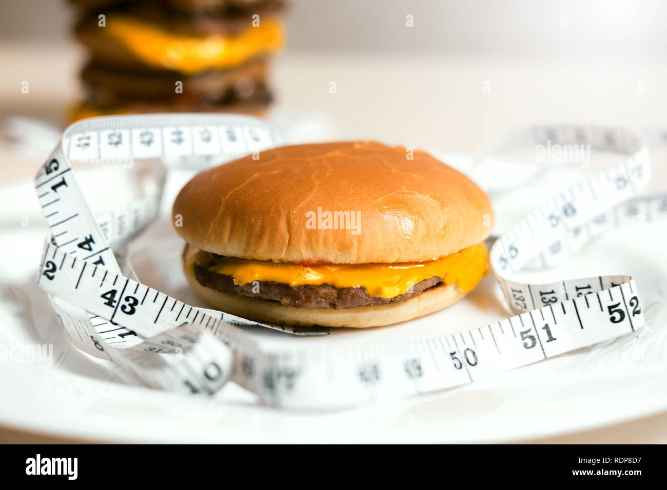 Bun hamburger tape measure hi-res stock photography and images - Alamy