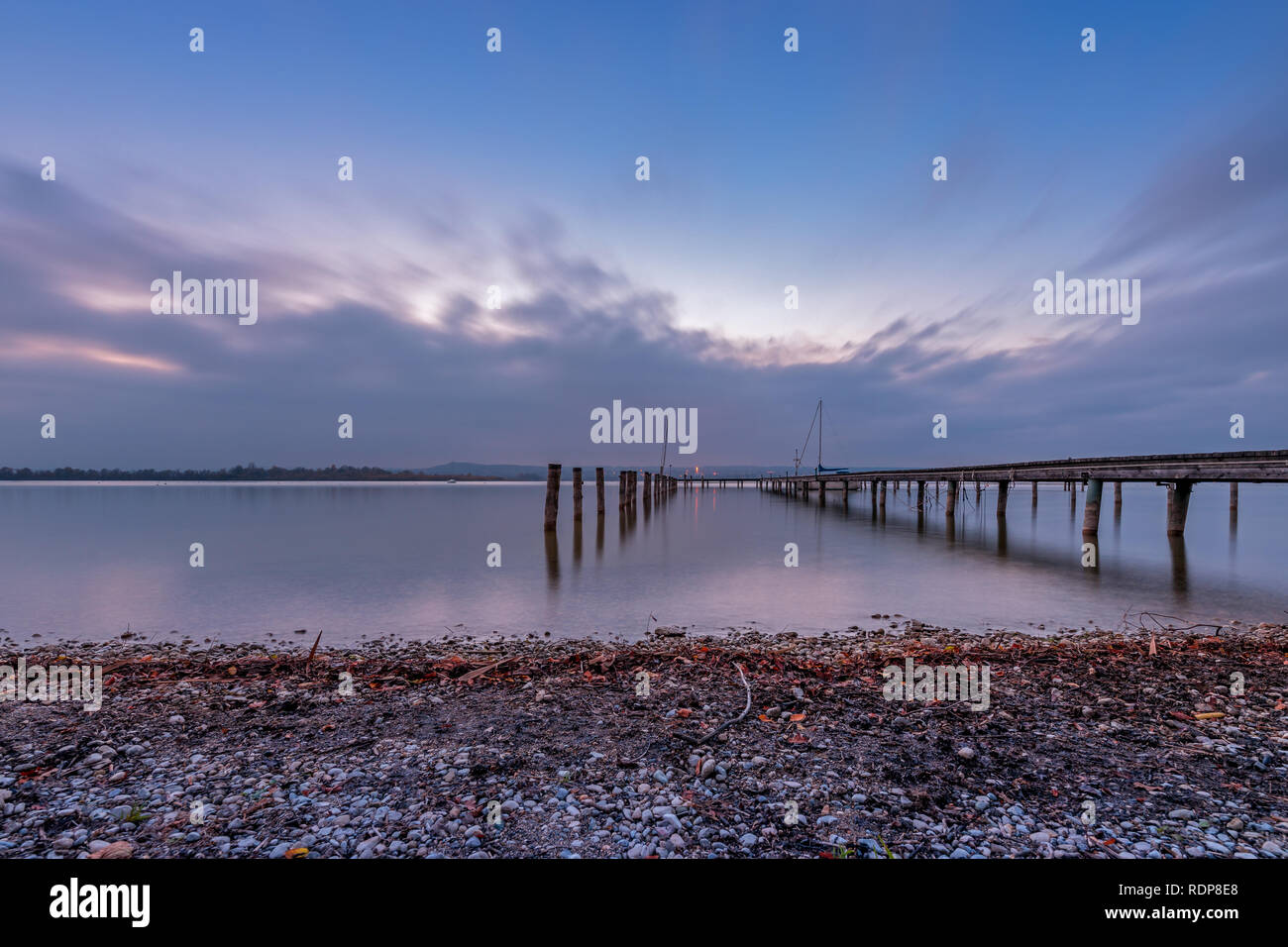 View from the eastern shore of the Ammersee to Dießen, long term exposure Stock Photo