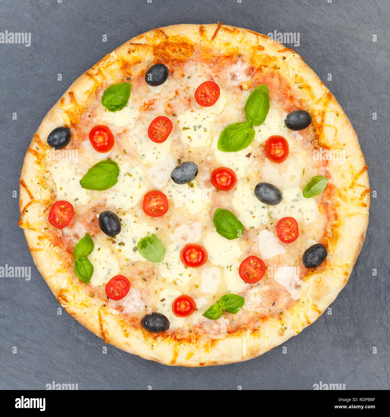 Pizza margarita margherita from above square on a slate Stock Photo