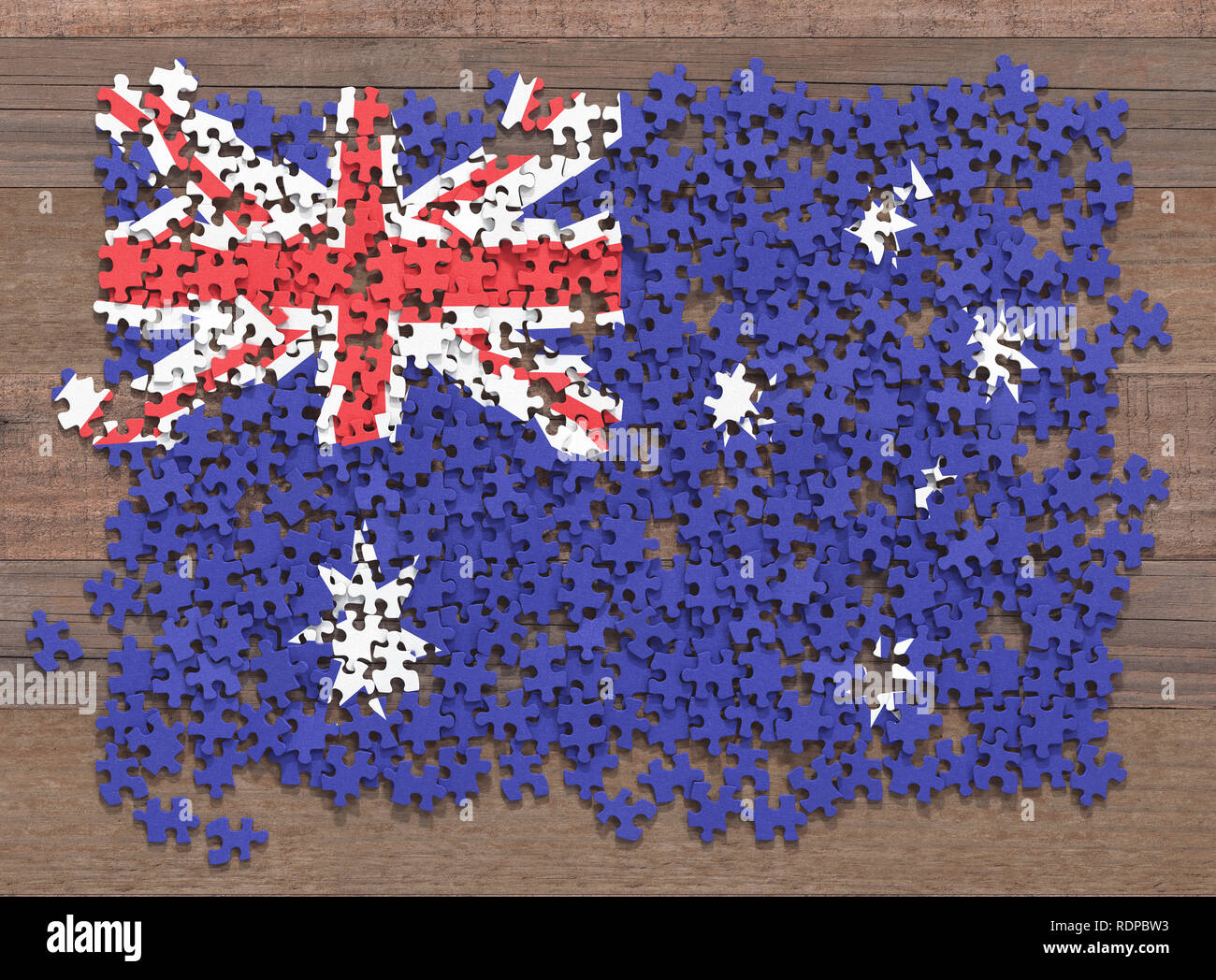 Australian flag up of separate jigsaw pieces, illustration Photo - Alamy