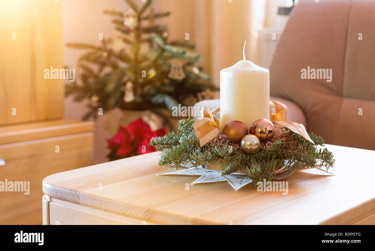 Christmas table decoration with spruce and candle Stock Photo