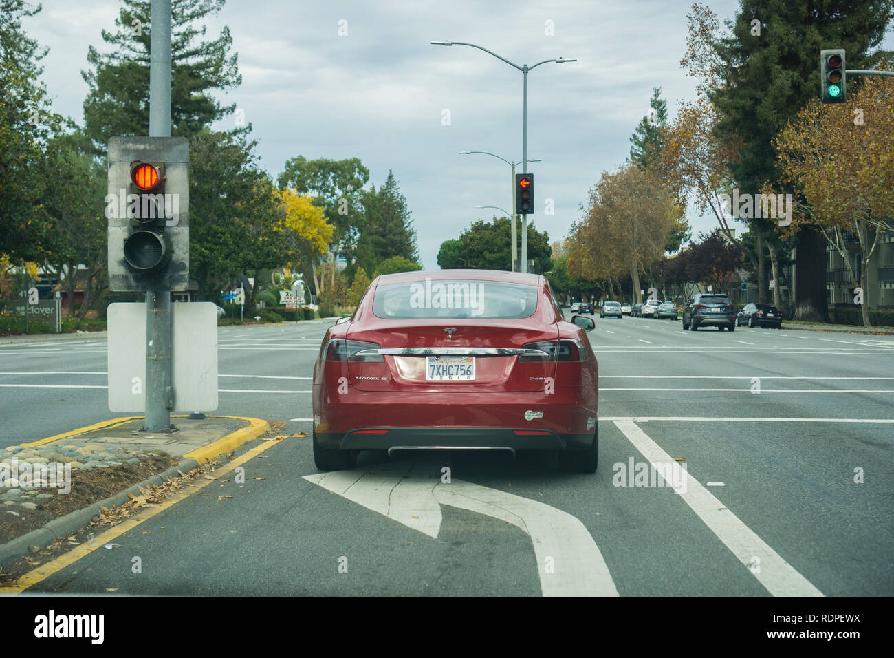 November 23, 2017 Sunnyvale/CA/USA - Tesla Model S P85D stopped at a traffic light on a cloudy day Stock Photo
