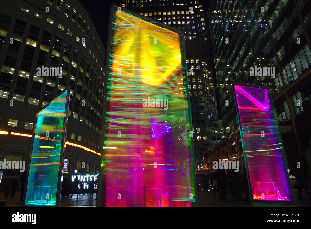 colourful columns of colour at the Winter Lights exhibition in Canary Wharf 2019 (Prismatica) Stock Photo