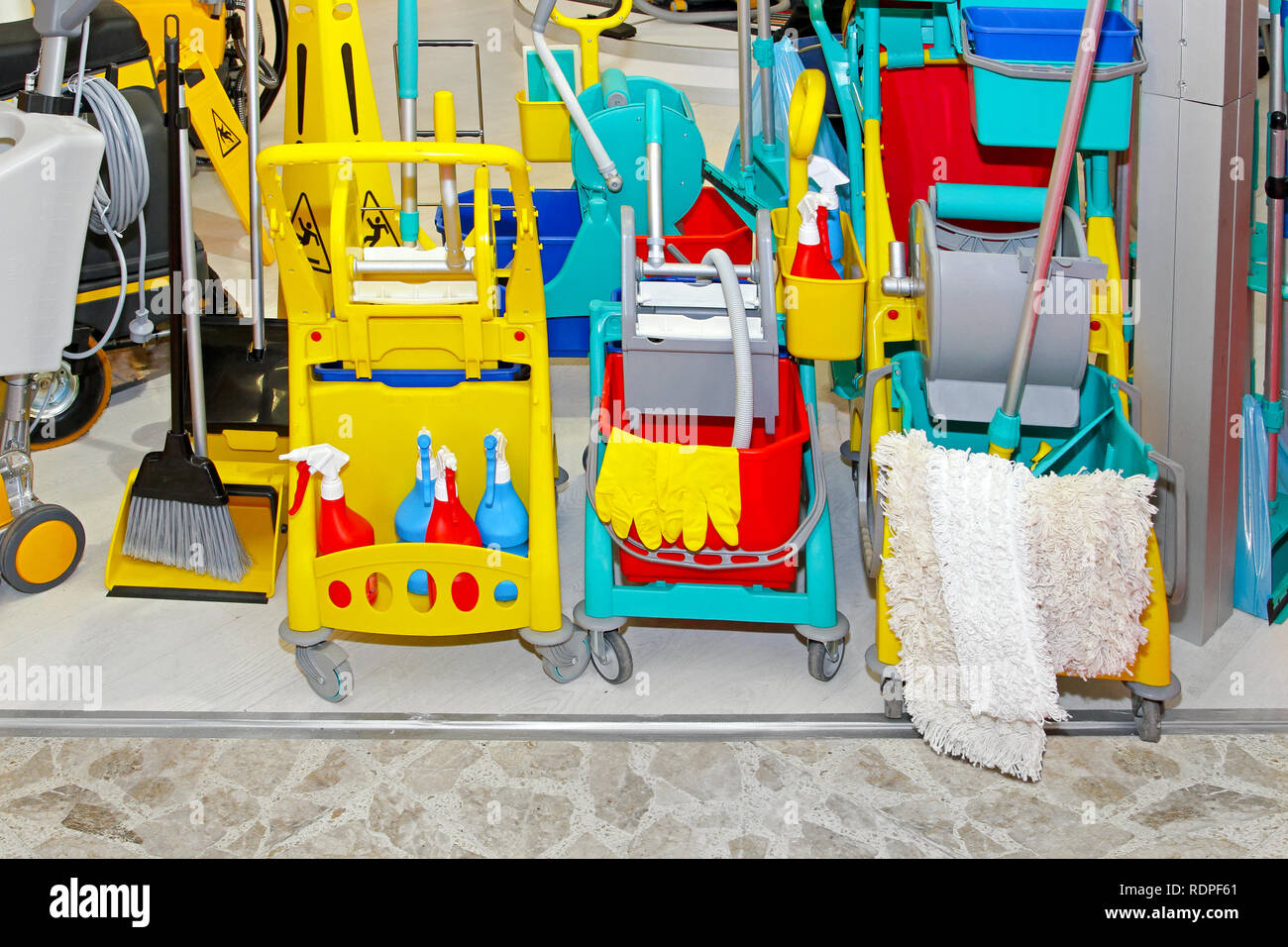 Proffessional cleaning tools buckets brums and mops Stock Photo - Alamy