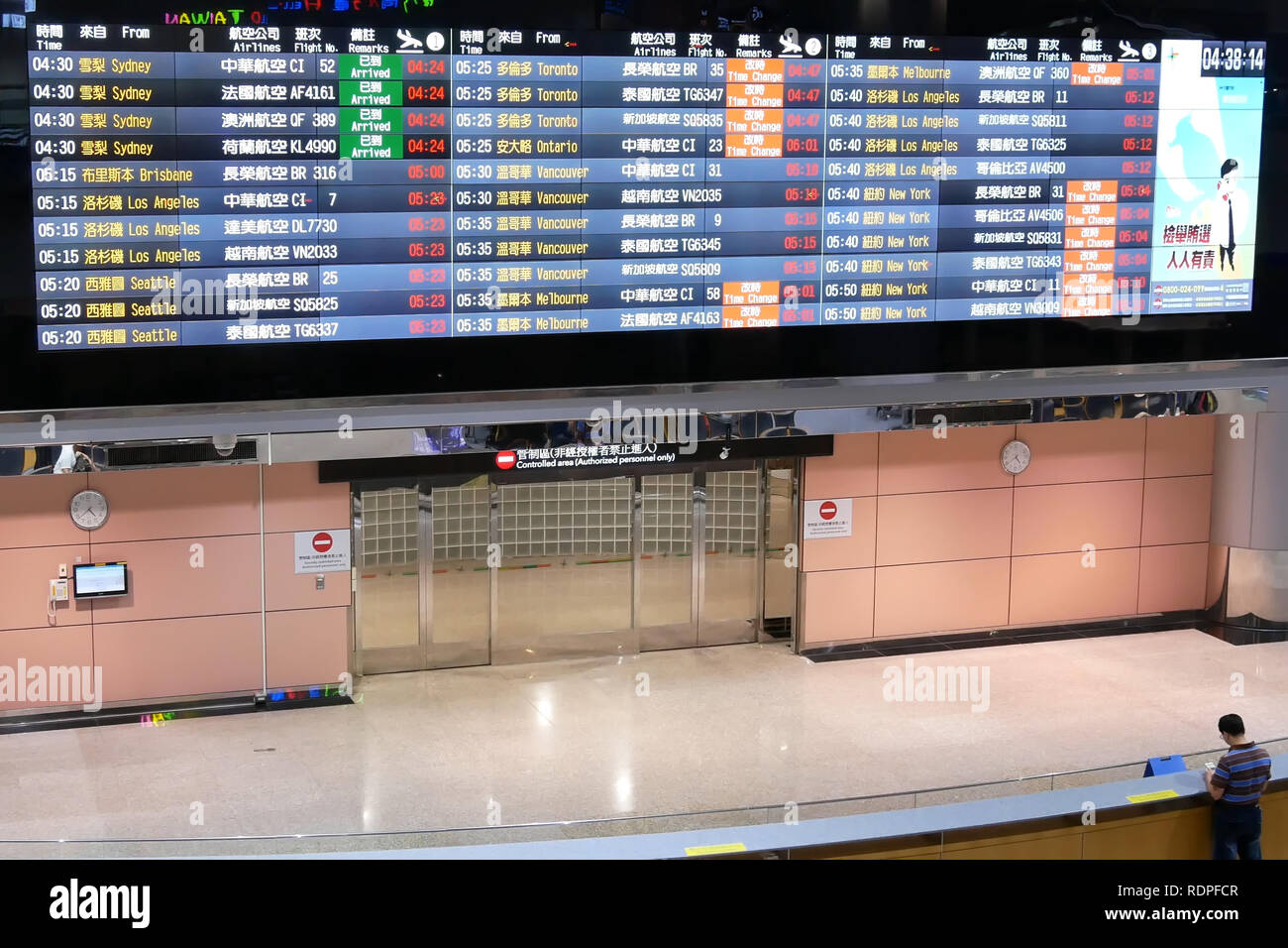 Taoyuan, Taiwan - November 07, 2018 : Close up of flight schedules board and terminal gate inside Taoyuan international airport in Taoyuan Taiwan Stock Photo