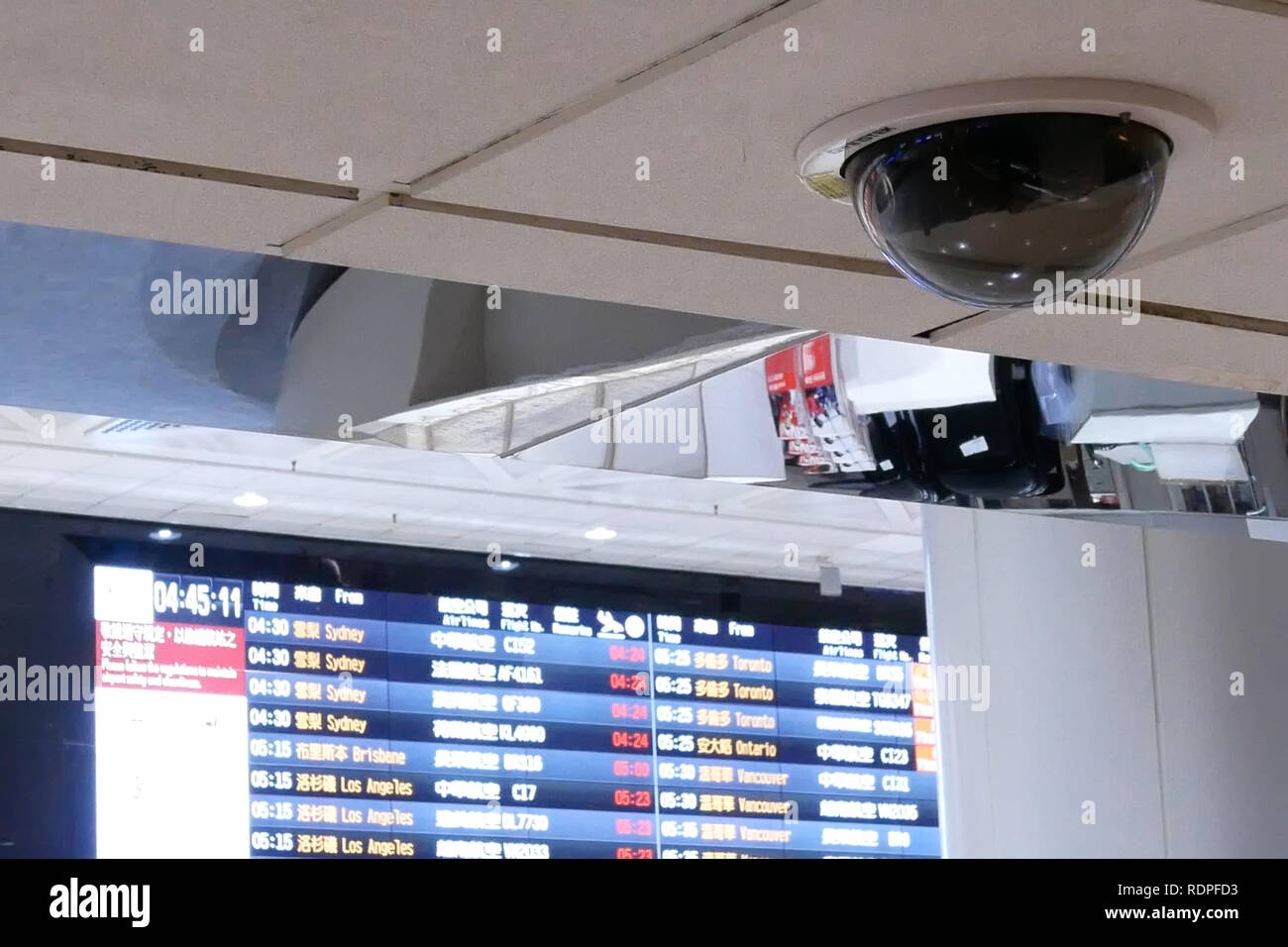 Taoyuan, Taiwan - November 07, 2018 : Close up of security camera in front of flight schedules board inside Taoyuan international airport in Taoyuan T Stock Photo