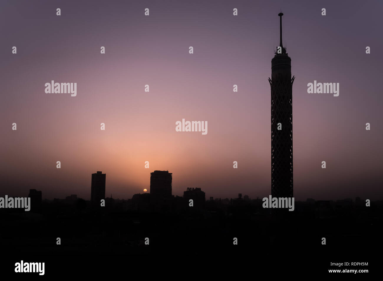 Silhouette shot for Cairo Tower and city in Egypt. The Cairo Tower  is a free-standing concrete tower in Cairo, Egypt. At 187 m (614 ft), it has been  Stock Photo
