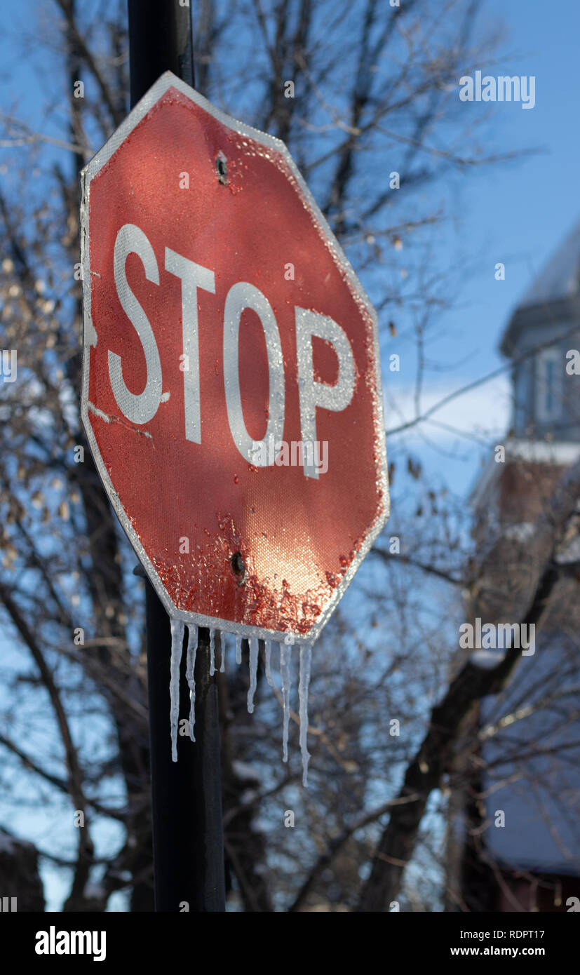 Icy stop sign Canadian winter Stock Photo - Alamy