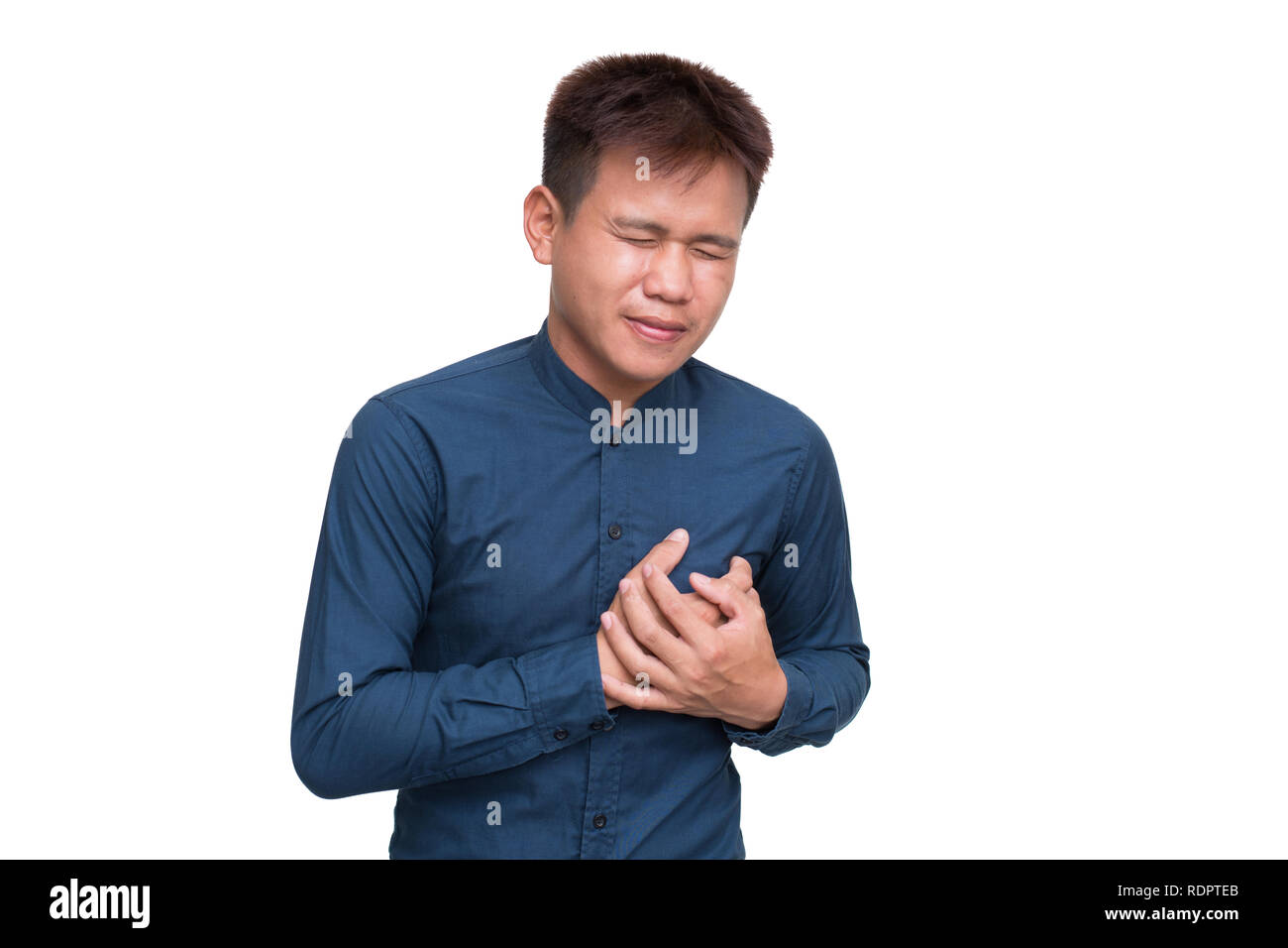 Asian man have a chest pain isolated on white background. With clipping path Stock Photo
