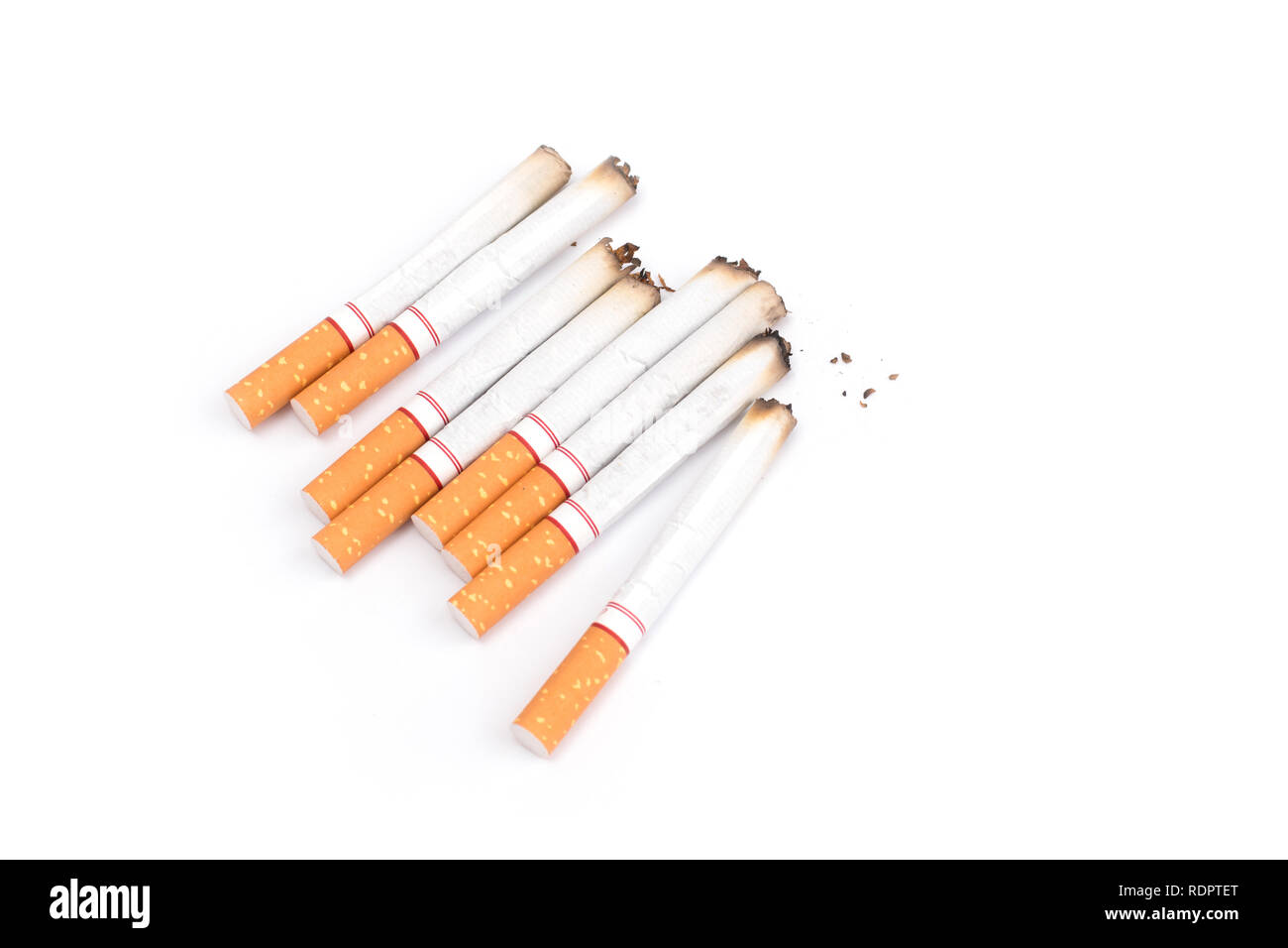Cigarettes with ash isolated on a white background Stock Photo