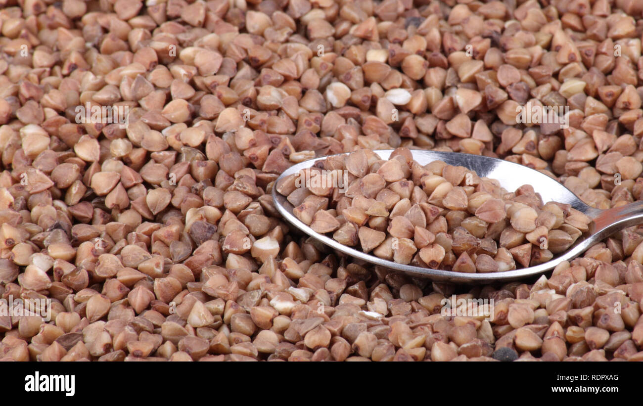 many of buckwheat background and teaspoon Stock Photo Alamy