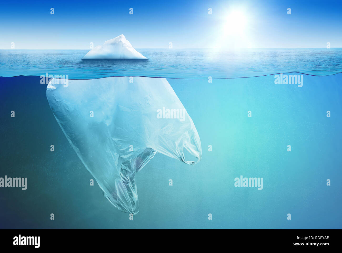 Huge vinyl bag floating in the open sea as an iceberg Stock Photo