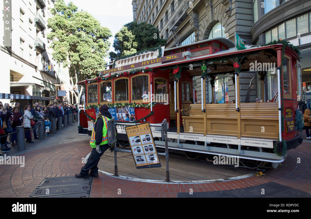 People queue around the block for a ride on the world famous San ...
