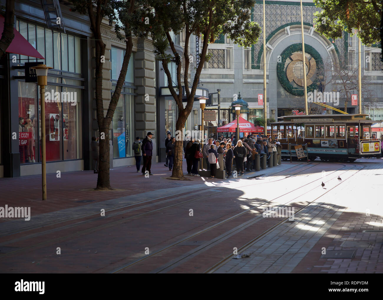 People queue around the block for a ride on the world famous San ...