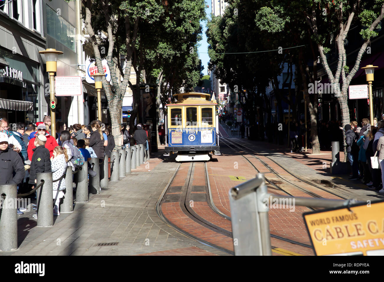 People queue around the block for a ride on the world famous San ...