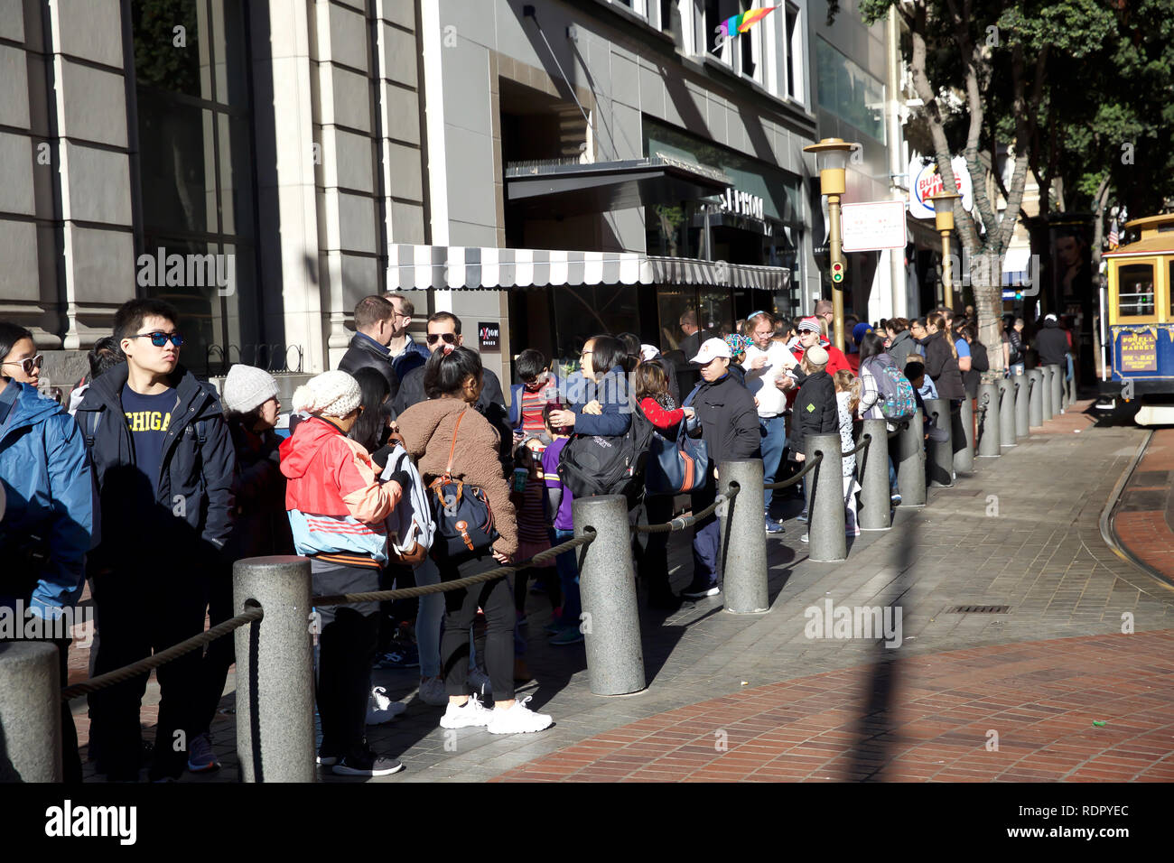 People queue around the block for a ride on the world famous San ...