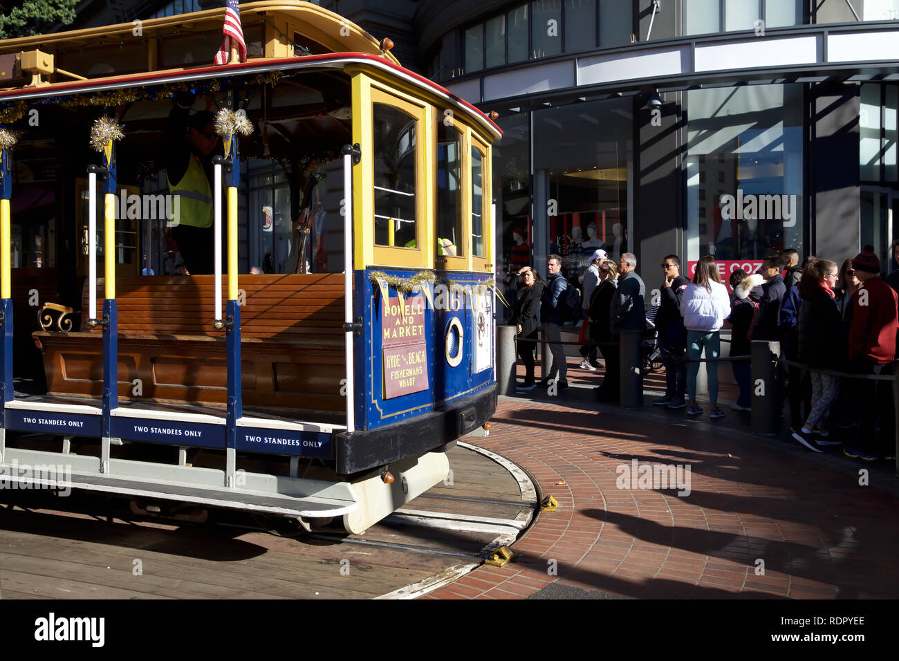 People queue around the block for a ride on the world famous San ...