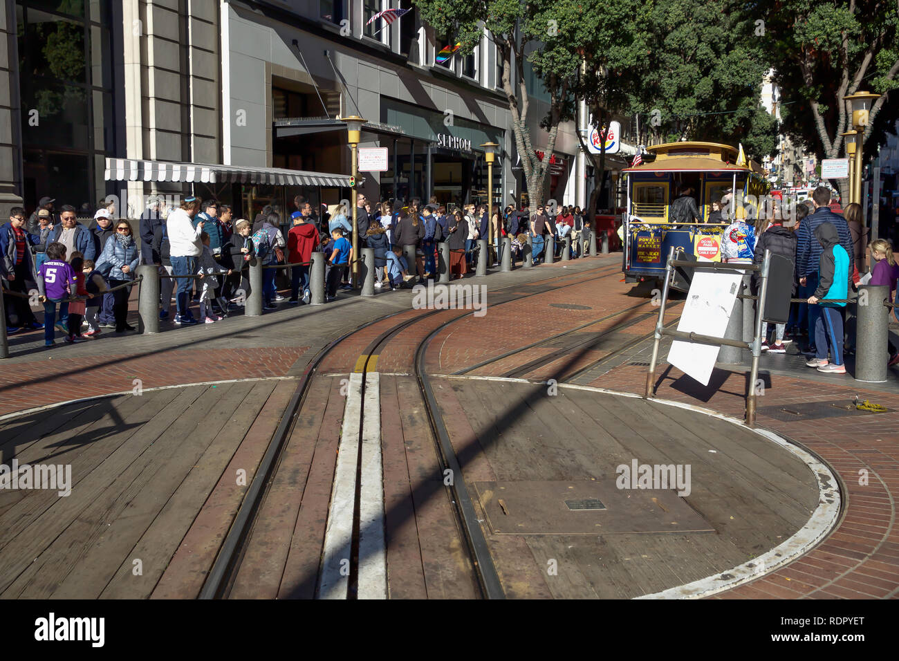 People queue around the block for a ride on the world famous San ...