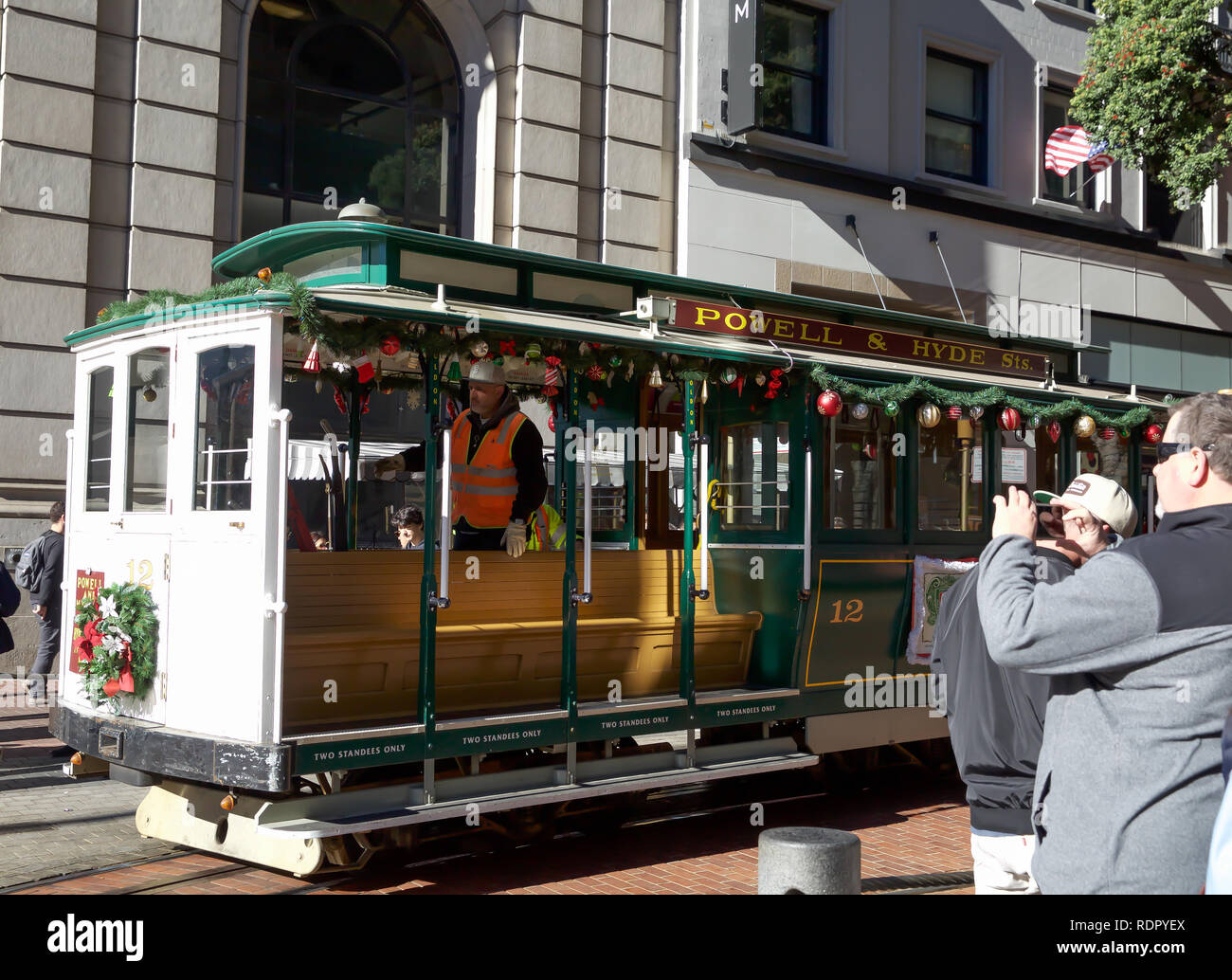 People queue around the block for a ride on the world famous San ...