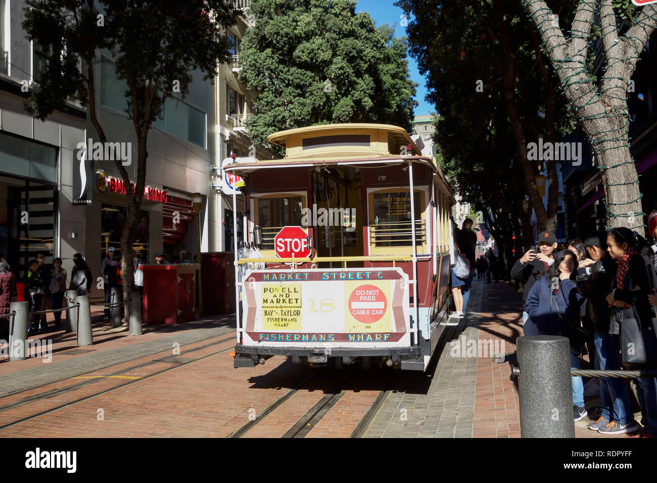 People queue around the block for a ride on the world famous San ...