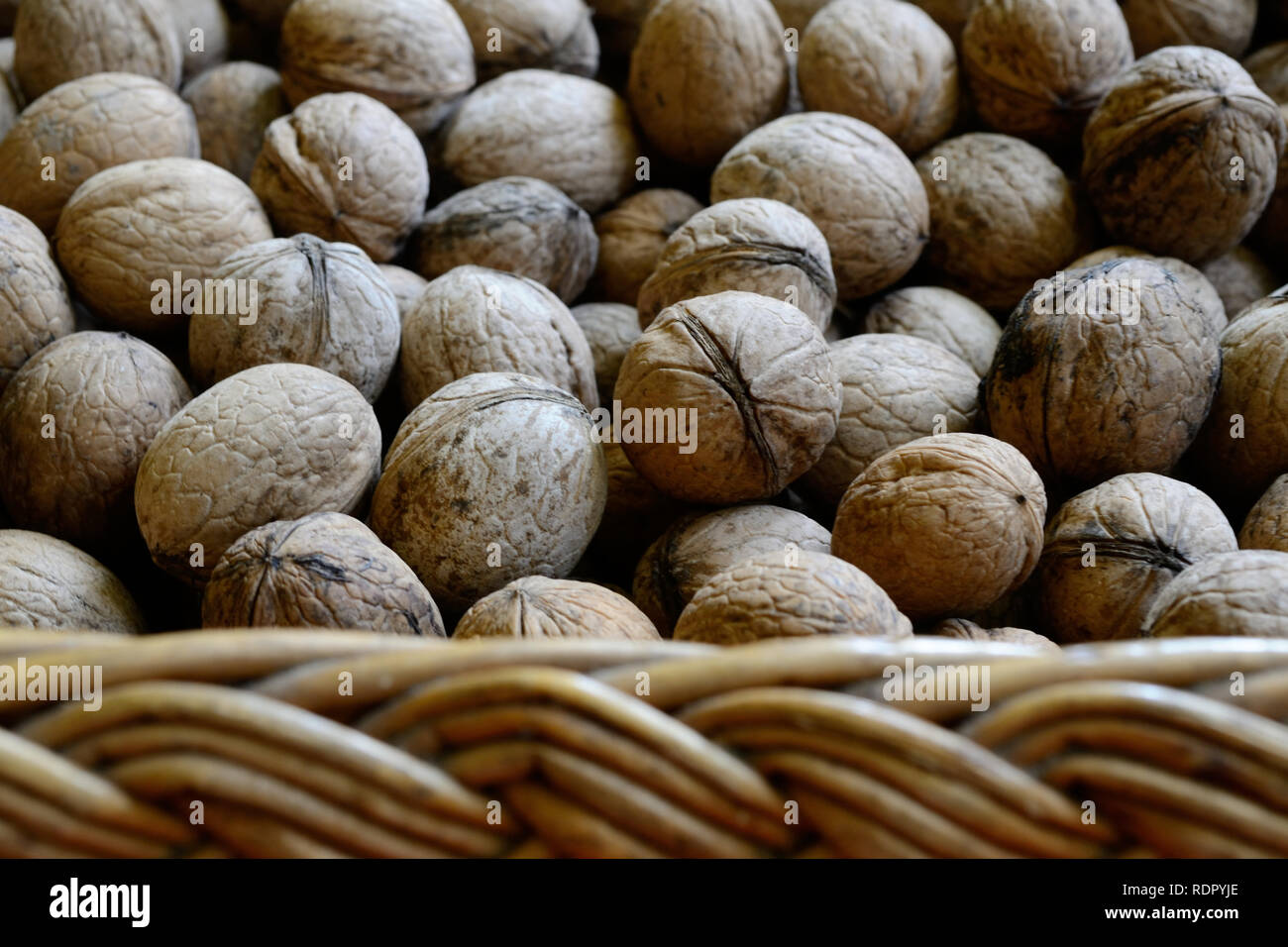 Nuts in basket theme Stock Photo