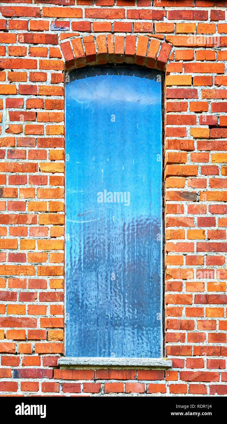 Old window in a red brick wall Stock Photo - Alamy