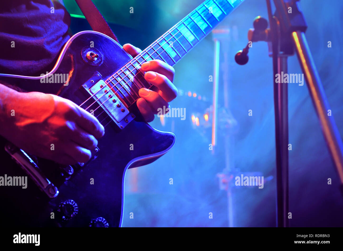 Guitarist Playing Guitar On Stage Closeup Of Musuician S Hands And Guitar Neck Stock Photo Alamy Guitarist Playing Guitar On Stage Closeup Of Musuician S Hands And Guitar Neck Stock Photo Alamy