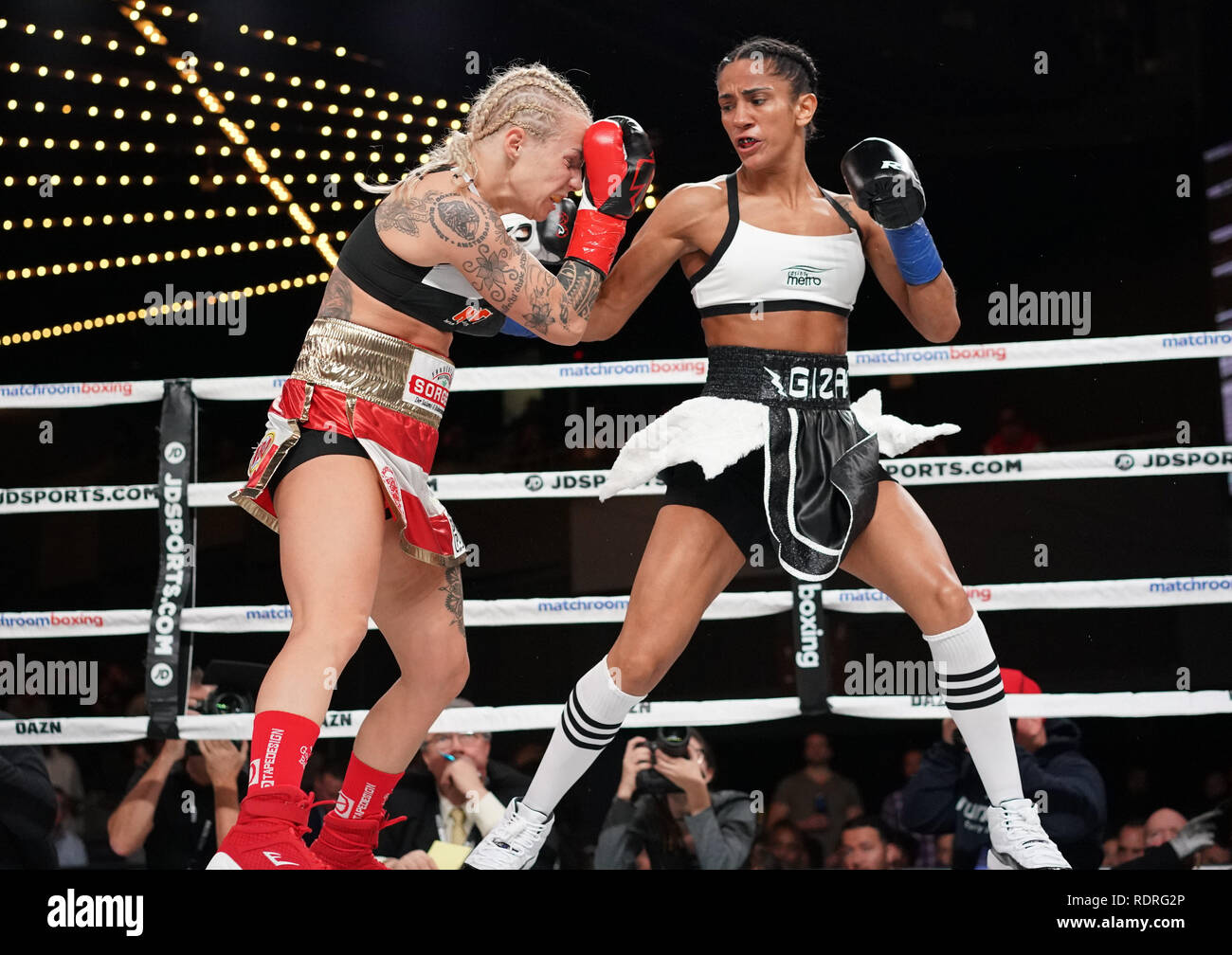 New York, New York, USA. 18th Jan, 2019. AMANDA SERRANO (black and white trunks) battles EVA VORABERGER for the vacant World Boxing Organization World Female Super Flyweight title at the Hulu Theater in Madison Square Garden in New York, New York. Credit: Joel Plummer/ZUMA Wire/Alamy Live News Stock Photo