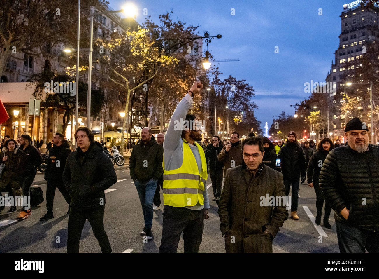 Taxi drivers are seen walking during the demonstration. After broken negotiations with the Government of Catalonia, the taxi drivers of Barcelona return to the indefinite strike by occupying the Gran Vía of Barcelona. Taxi drivers have been touring the center of Barcelona in a demonstration where there have been attacks against Uber and Cabify drivers with a VTC license. Stock Photo